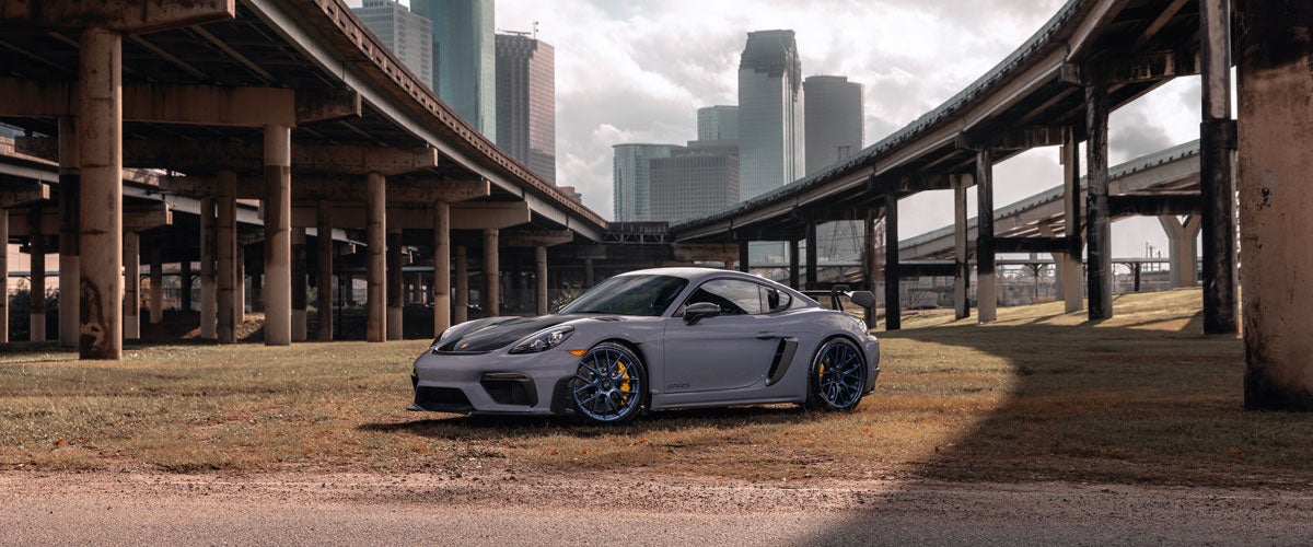 A Porsche 718 Cayman GT4 RS downtown